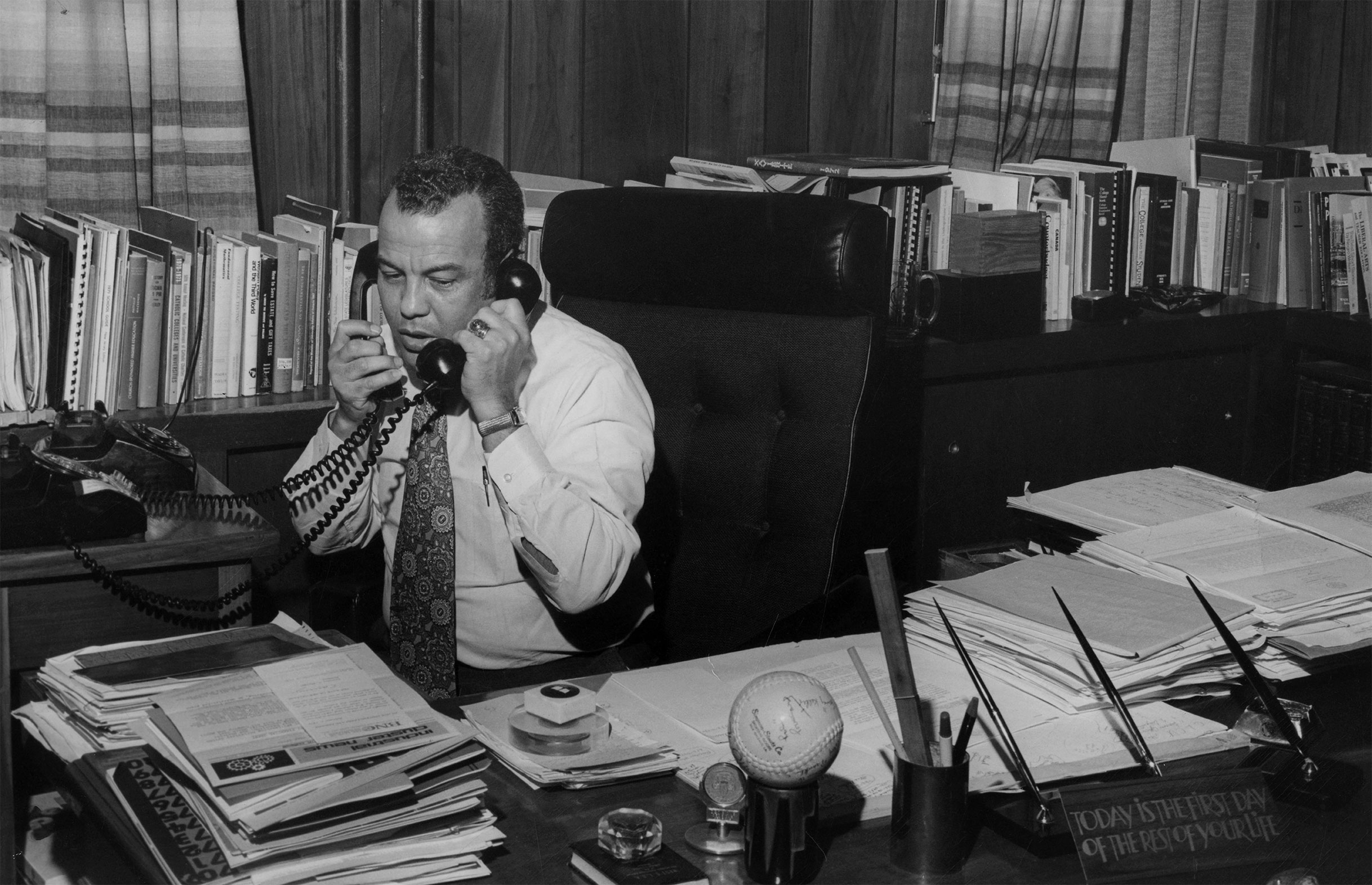 Xavier President Norman Francis at his desk
